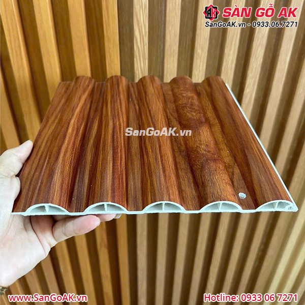 Tấm ốp lam sóng tròn vân gỗ đỏ cam