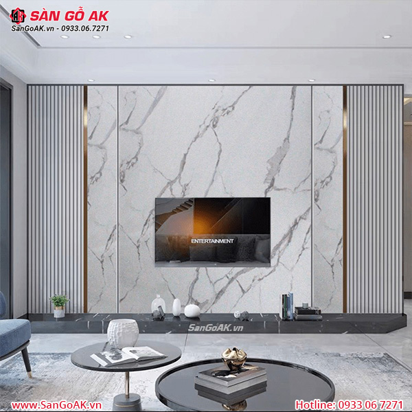 Ốp vách tivi phòng khách sang trọng với lam sóng và pvc vân đá