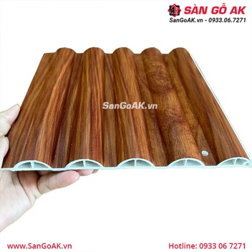 Tấm ốp lam sóng tròn vân gỗ đỏ cam