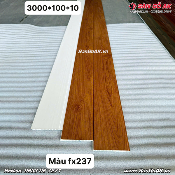 Tấm nhựa Nano bản nhỏ FX237 vân gỗ vàng đậm dùng để ốp tường, ốp trần nội thất