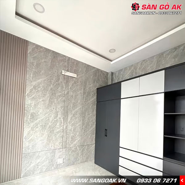 Tấm PVC325 vân đá xám có bề mặt sáng bóng chống trầy xước và dễ dàng vệ sinh